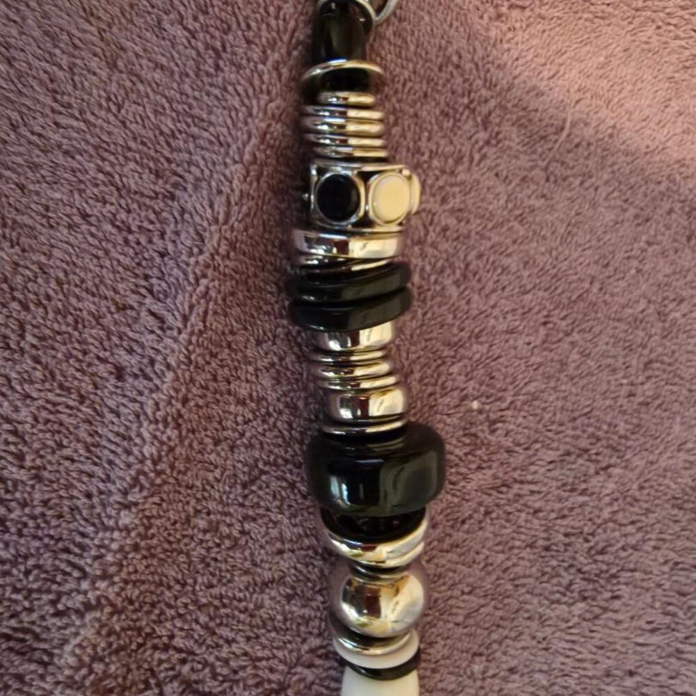 Black, White, Silver Metal Necklace on leather roping. - Picture 2 of 2